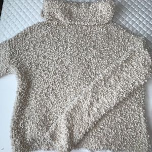 wooly turtleneck sweater